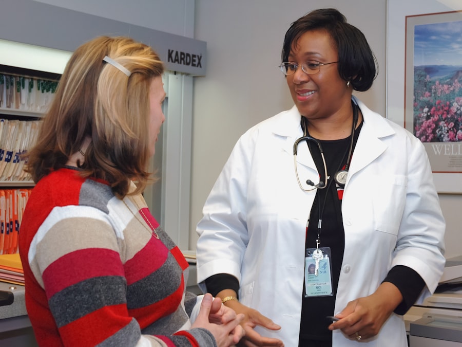 Healthcare worker assisting a client at a pharmacy counter